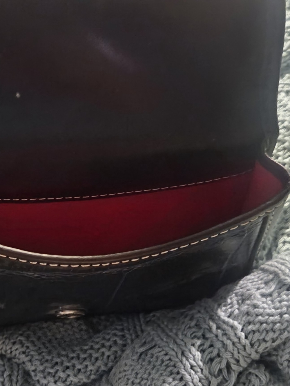 Dooney & Bourke Black Leather Clutch with Red Interior